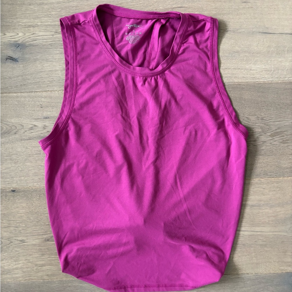 Gottex muscle shirt , ties in the back  pink color in S